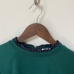 K Crew Ruffle Hem Zipper Back Sweatshirt